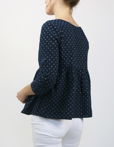 Eugenie blouse made from a navy blue fabric, 3/4 back view