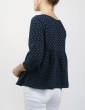 sewing pattern Eugenie blouse made from a navy blue fabric, 3/4 back view