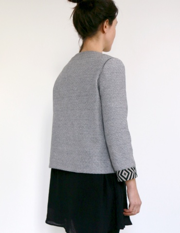 Claudie jacket in black and white thick cotton, with no collar, back view