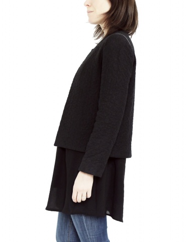 Claudie jacket in black woolen double gauze, with no collar, profile view